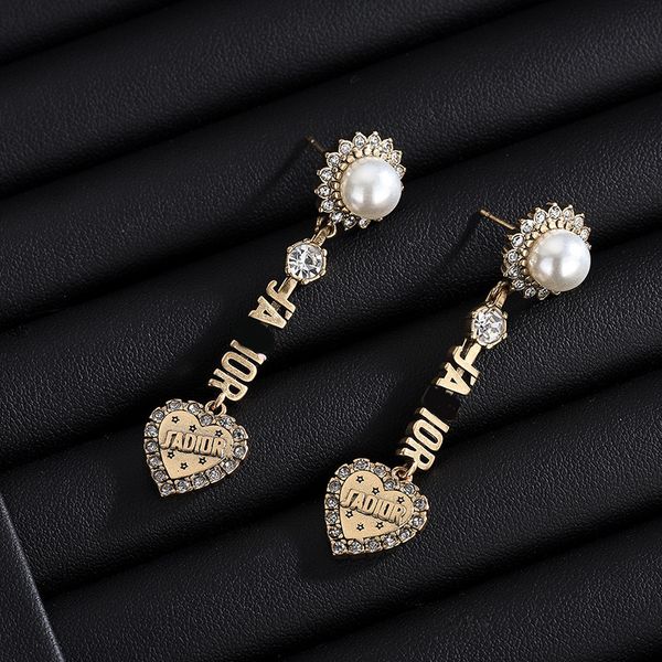 tassel pearl earrings inlaid with diamond star love women's letters new fashion, Golden
tassel pearl earrings inlaid with diamond star love women's letters new fashion, Golden