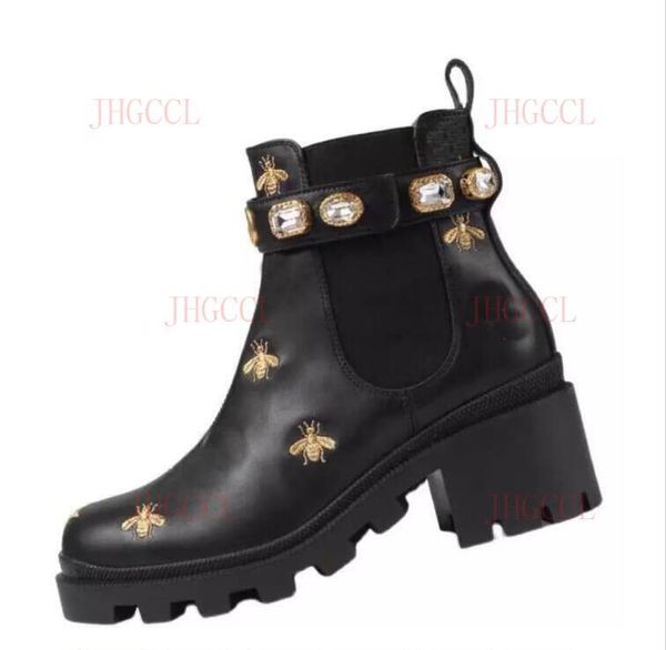 winter low barrel round head thick heel rivet black european and american ultra high solid color female boots
winter low barrel round head thick heel rivet black european and american ultra high solid color female boots