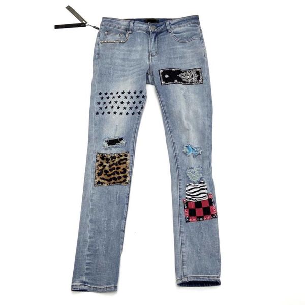 men's jeans blue star light leopard pattern patch hole versatile with slim europe and america tide card high street male.
men's jeans blue star light leopard pattern patch hole versatile with slim europe and america tide card high street male.