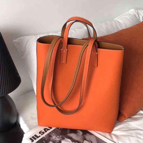 designer bagsh style new double-sided leather vertical version tote bag head layer cowhide single-shoulder multi-purpose large-capacity fash
designer bagsh style new double-sided leather vertical version tote bag head layer cowhide single-shoulder multi-purpose large-capacity fash
