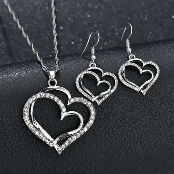 earrings & necklace gu li classic hollow out double heart-shaped pendant earring crystal rhinestone for women lovers wedding jewelry set, Silver
earrings & necklace gu li classic hollow out double heart-shaped pendant earring crystal rhinestone for women lovers wedding jewelry set, Silver