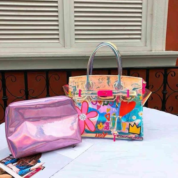 2021 new fashion laser hand printing beach korean jelly one shoulder transparent messenger bag
2021 new fashion laser hand printing beach korean jelly one shoulder transparent messenger bag