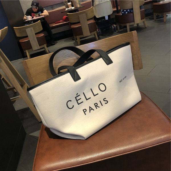 canvas women's capacity hand shopping printed letter child mother large wing bag
canvas women's capacity hand shopping printed letter child mother large wing bag