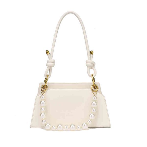 french minority design bag women's fashion versatile pearl hand self-made single shoulder messenger armpit, Black;red
french minority design bag women's fashion versatile pearl hand self-made single shoulder messenger armpit, Black;red