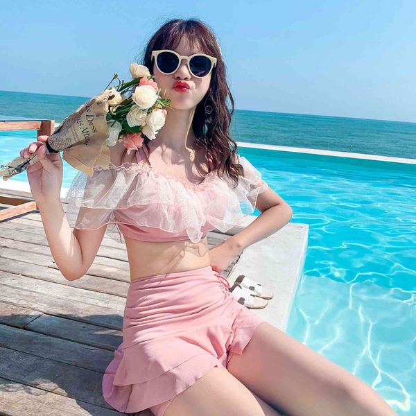 split swimsuit women's two-piece skirt style flat corner spring bathing suit, White;black
split swimsuit women's two-piece skirt style flat corner spring bathing suit, White;black