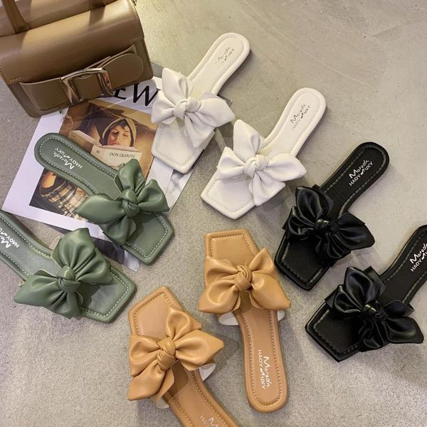 slippers bow-knot women summer fashion outer wear flat beach shoes comfortable one-word sandals and women's, Black 
slippers bow-knot women summer fashion outer wear flat beach shoes comfortable one-word sandals and women's, Black