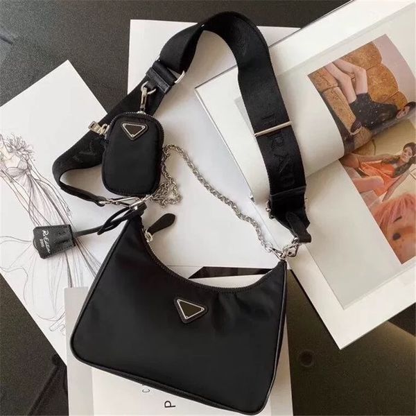 design hand 2021 new three in one armpit nylon cloth bag women's chain one shoulder messenger bag cow leather zero wallet wpwi
design hand 2021 new three in one armpit nylon cloth bag women's chain one shoulder messenger bag cow leather zero wallet wpwi