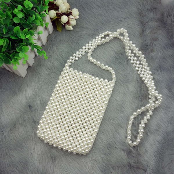 boutique fashion pearl bag, handmade beaded mobile phone leisure one shoulder slant across small can be color
boutique fashion pearl bag, handmade beaded mobile phone leisure one shoulder slant across small can be color
