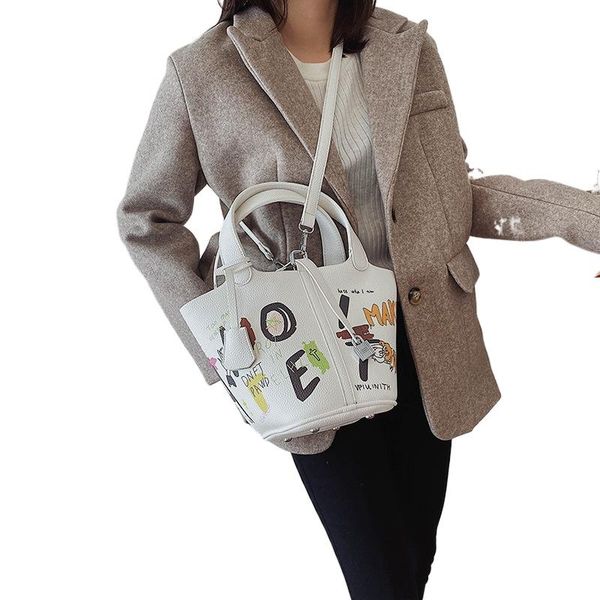japanese graffiti basket bucket bag female large-capacity handbag hand-painted printing cute cartoon girls totes personality duffel bags
japanese graffiti basket bucket bag female large-capacity handbag hand-painted printing cute cartoon girls totes personality duffel bags