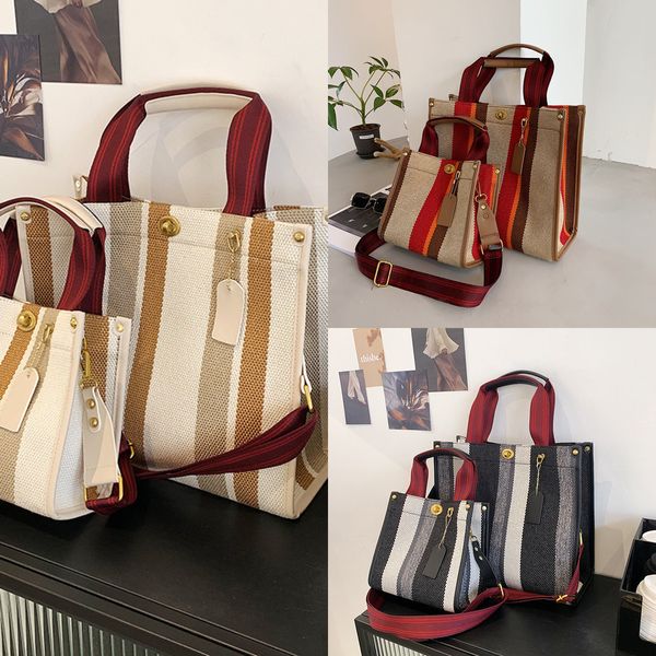 new fashion portable one shoulder tote women's bag size model popular canvas stripe messenger handbags
new fashion portable one shoulder tote women's bag size model popular canvas stripe messenger handbags