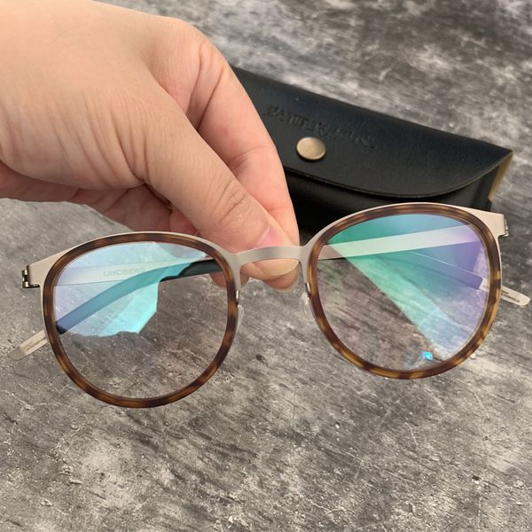 jiang wentong eyeglass round myopia frame ultra light no screw danish and women's glasses, White;black
jiang wentong eyeglass round myopia frame ultra light no screw danish and women's glasses, White;black