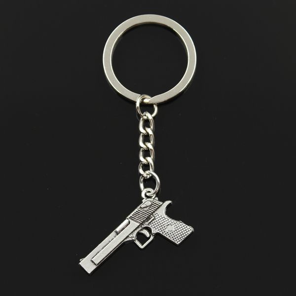new fashion keychain 45x20mm gun browning pistol pendants diy men jewelry car key chain ring holder souvenir for gift, Silver
new fashion keychain 45x20mm gun browning pistol pendants diy men jewelry car key chain ring holder souvenir for gift, Silver