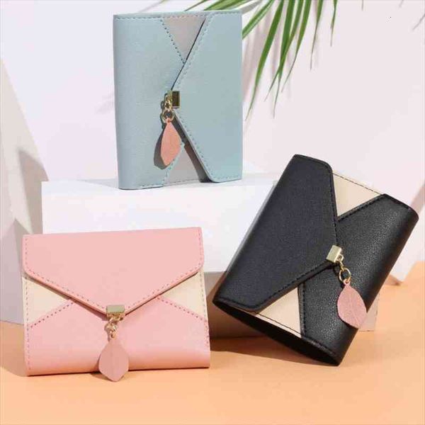 contrasting geometric ladies wallet short fashion leather buckle coin purse tassel money credit card holder, Red;black
contrasting geometric ladies wallet short fashion leather buckle coin purse tassel money credit card holder, Red;black