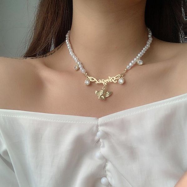 2021 new arrival french retro letter angel pendant pearl necklace female clavicle chain short net red necklace fast delivery, Silver
2021 new arrival french retro letter angel pendant pearl necklace female clavicle chain short net red necklace fast delivery, Silver