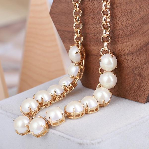 chokers european and american inlaid single row white pearl gold-plated fashion simple short necklace, Golden;silver
chokers european and american inlaid single row white pearl gold-plated fashion simple short necklace, Golden;silver