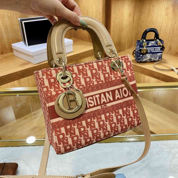 fashionable and versatile embroidery handbag style single shoulder messenger bag women's purses
fashionable and versatile embroidery handbag style single shoulder messenger bag women's purses