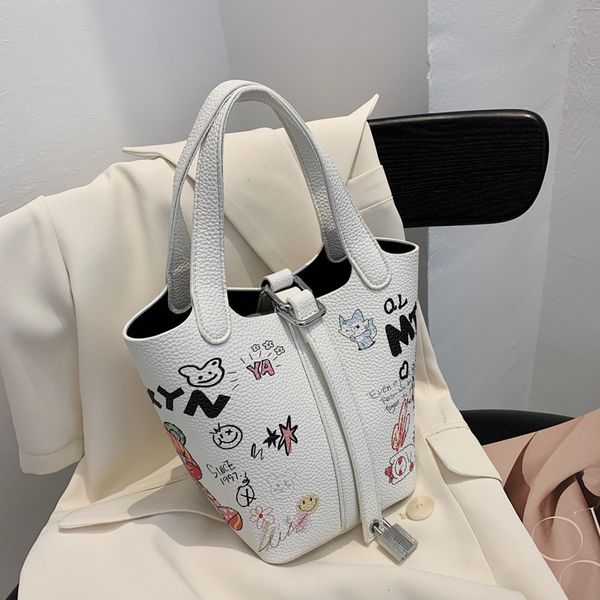 handbag 2021 trend graffiti bucket bag letter vegetable basket cute cartoon portable single shoulder diagonal
handbag 2021 trend graffiti bucket bag letter vegetable basket cute cartoon portable single shoulder diagonal
