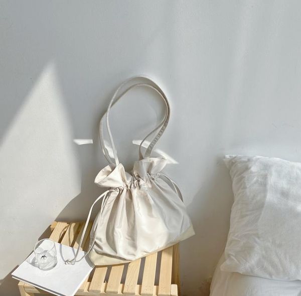 female bags spring/summer style solid color personalized pleated canva drawstring soft canvas shoulder bag
female bags spring/summer style solid color personalized pleated canva drawstring soft canvas shoulder bag