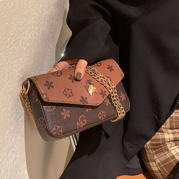 factory direct sale 75% off women's new printing single shoulder messenger chain mobile three in one envelope small square bags
factory direct sale 75% off women's new printing single shoulder messenger chain mobile three in one envelope small square bags