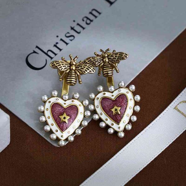 luxury earrings fashion designer jewelry d family brass bee female cd letter pearl dijia net red back hanging love, Golden
luxury earrings fashion designer jewelry d family brass bee female cd letter pearl dijia net red back hanging love, Golden