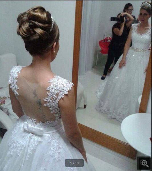 2021 robe de mariage white tulle ball gown wedding dresses beaded lace appliques cap sleeve vintage bridal gowns princess puffy elegant mode
2021 robe de mariage white tulle ball gown wedding dresses beaded lace appliques cap sleeve vintage bridal gowns princess puffy elegant mode