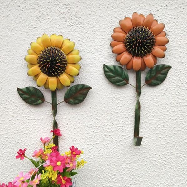 hooks & rails wrought iron sunflower hook plant vintage art ornaments indoor outdoor decor wall hanging creative shop decoration 
hooks & rails wrought iron sunflower hook plant vintage art ornaments indoor outdoor decor wall hanging creative shop decoration