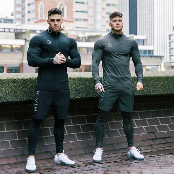 men's shorts muscle sports suit fitness two piece trousers long sleeve elastic, White;black
men's shorts muscle sports suit fitness two piece trousers long sleeve elastic, White;black