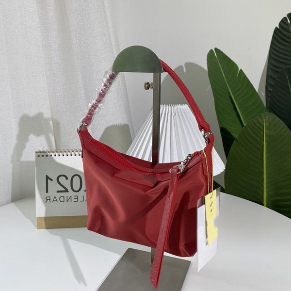 2021 new longyu bag explosion underarm women's oxford cloth small square embroidered horse mini portable one shoulder
2021 new longyu bag explosion underarm women's oxford cloth small square embroidered horse mini portable one shoulder