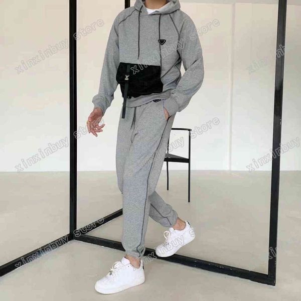 21ss mens women designers tracksuits hooded nylon pocket metal triangle streetwear windbreaker fashion tracksuit men designer black gray
21ss mens women designers tracksuits hooded nylon pocket metal triangle streetwear windbreaker fashion tracksuit men designer black gray