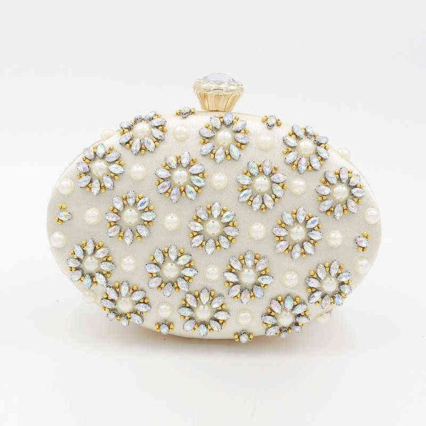 style dinner bag with diamond round egg shape color hand holding dinner bag one shoulder straddle women's ess
style dinner bag with diamond round egg shape color hand holding dinner bag one shoulder straddle women's ess