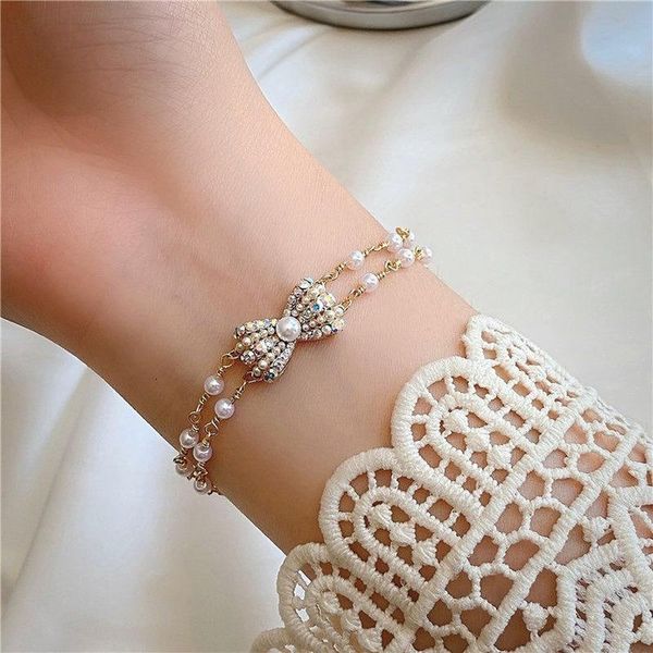 charm bracelets elegant sparkling zircon bowknot bracelet for women girls double layer pearls adjustable weddings jewelry, Golden;silver
charm bracelets elegant sparkling zircon bowknot bracelet for women girls double layer pearls adjustable weddings jewelry, Golden;silver