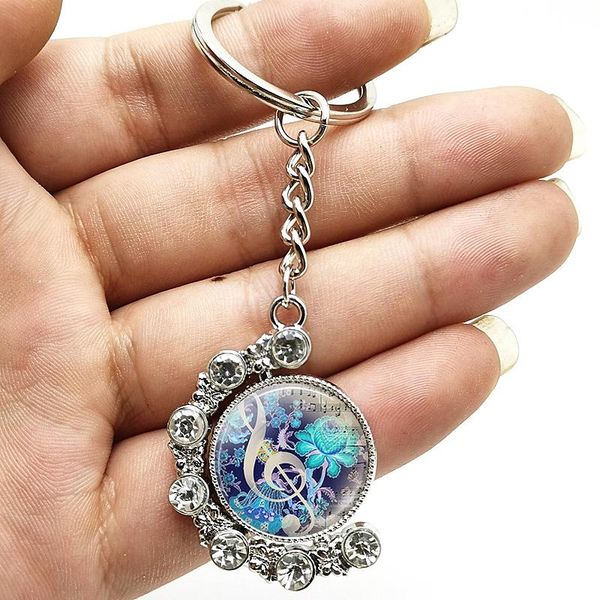 keychains fashion musical instrument notes double-sided rotating crystal pendant key ring convex round men and women gifts, Silver
keychains fashion musical instrument notes double-sided rotating crystal pendant key ring convex round men and women gifts, Silver