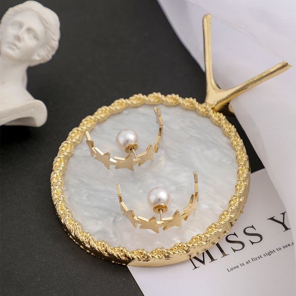 925 silver needle korean version east gate earrings five pointed star semicircle c-type pearl personality fashion temperament
925 silver needle korean version east gate earrings five pointed star semicircle c-type pearl personality fashion temperament