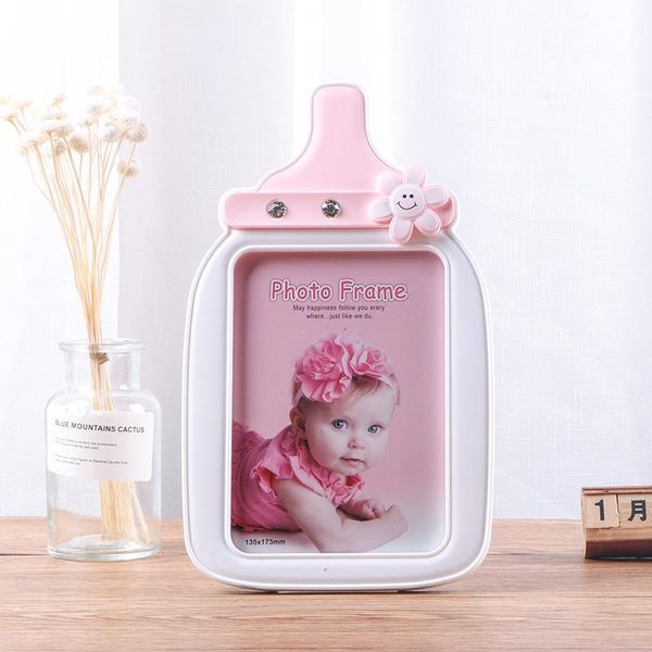 frames 7-inch cartoon po frame set-up creative children's cute wall-mounted baby bottle carousel picture
frames 7-inch cartoon po frame set-up creative children's cute wall-mounted baby bottle carousel picture