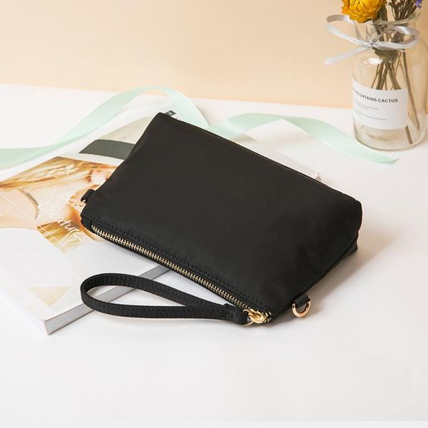 nylon canvas mobile phone bag female portable hand-held ins super fire net red simple travel messenger small cosmetic bags & cases
nylon canvas mobile phone bag female portable hand-held ins super fire net red simple travel messenger small cosmetic bags & cases