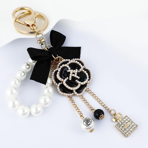 keychains bow-knot imitation pearl perfume crystal bottle iron tower chain keychain car key ring bag charm accessories girl keyring gift, Silver
keychains bow-knot imitation pearl perfume crystal bottle iron tower chain keychain car key ring bag charm accessories girl keyring gift, Silver