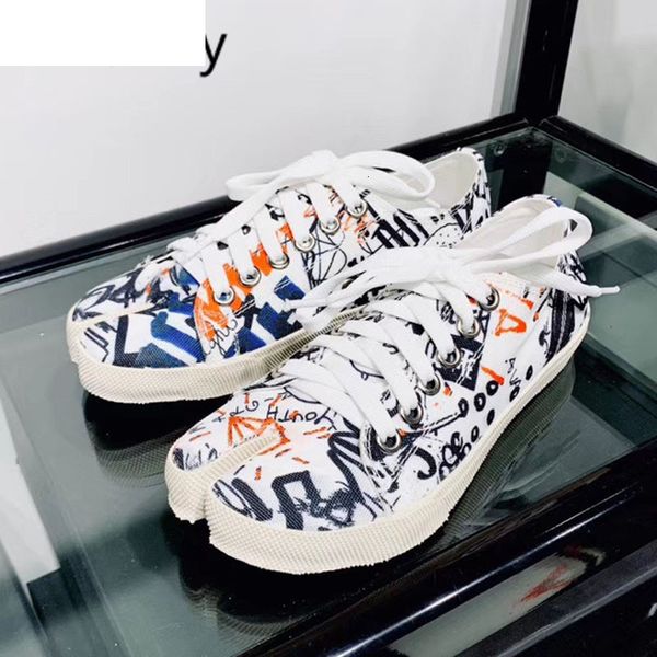 sandals spring summer split toe causal shoes woman graffiti pattern lace up shallow canvas pig trotter horseshoe flat shoes plus s, Black
sandals spring summer split toe causal shoes woman graffiti pattern lace up shallow canvas pig trotter horseshoe flat shoes plus s, Black