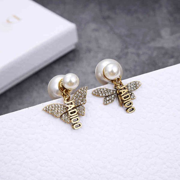 brass 925 silver needle pearl earrings and butterfly asymmetric earrings simple style, Golden
brass 925 silver needle pearl earrings and butterfly asymmetric earrings simple style, Golden