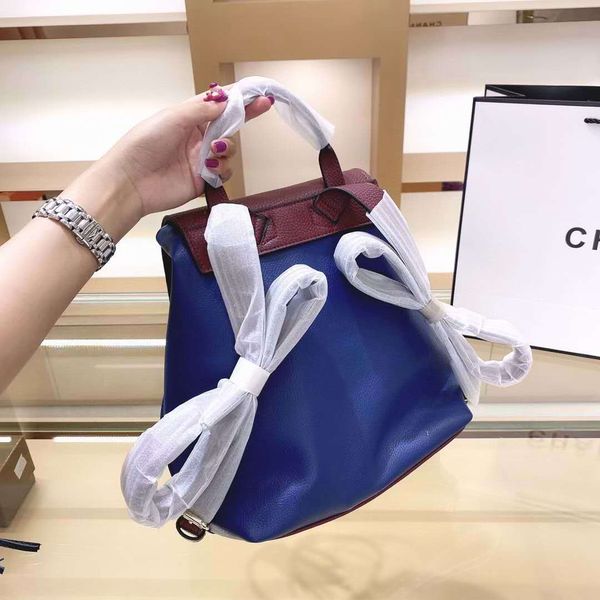 hip ysiykiy factory whosale price original design two-tone women bag backpack famous fashion springs palm with tassel
hip ysiykiy factory whosale price original design two-tone women bag backpack famous fashion springs palm with tassel