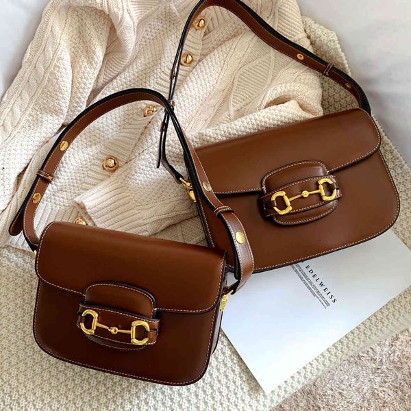 wholesale saddle horse cross clasp 1955 women's carrying real cowhide postman one shoulder box bean curd small square bag luxurys desig
wholesale saddle horse cross clasp 1955 women's carrying real cowhide postman one shoulder box bean curd small square bag luxurys desig