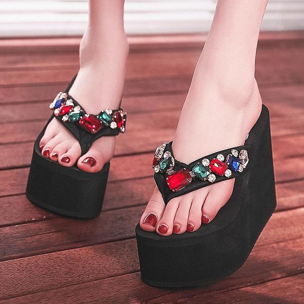 slippers increased 11cm high slope with women's word holiday sandals and gem decoration beach flip-flops, Black
slippers increased 11cm high slope with women's word holiday sandals and gem decoration beach flip-flops, Black