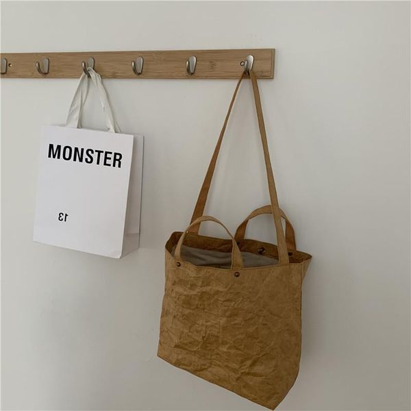 evening bags washed kraft paper shoulder messenger bag solid color large capacity tote shopping handbag
evening bags washed kraft paper shoulder messenger bag solid color large capacity tote shopping handbag