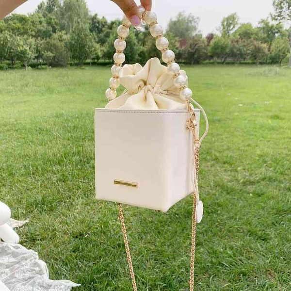 shopping bags spring mini boxshape pu leather crossbody chain drawstring shoulder branded designer female summer purses 220303
shopping bags spring mini boxshape pu leather crossbody chain drawstring shoulder branded designer female summer purses 220303