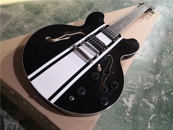 35 black electric guitar white stripe semi-hollow maple body mahogany neck rosewood fingerboard chrome tremolo l pickups white binding
35 black electric guitar white stripe semi-hollow maple body mahogany neck rosewood fingerboard chrome tremolo l pickups white binding
