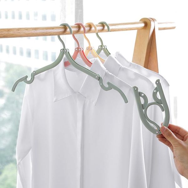 8pcsportable travel cloth folding hanger non-slip plastic foldable rack drying clothespin trouser coat towel sock closet storage hangers & r
8pcsportable travel cloth folding hanger non-slip plastic foldable rack drying clothespin trouser coat towel sock closet storage hangers & r