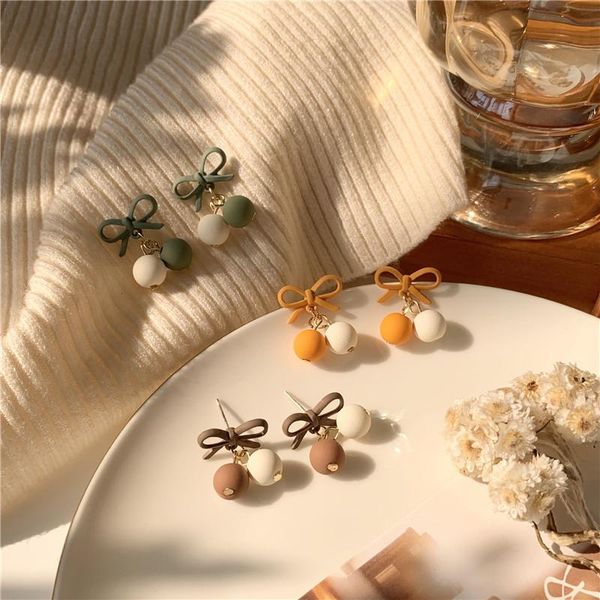 south korea's simple and compact bow hit color ball pendant earrings jewelry gift for women girl stud, Golden;silver
south korea's simple and compact bow hit color ball pendant earrings jewelry gift for women girl stud, Golden;silver