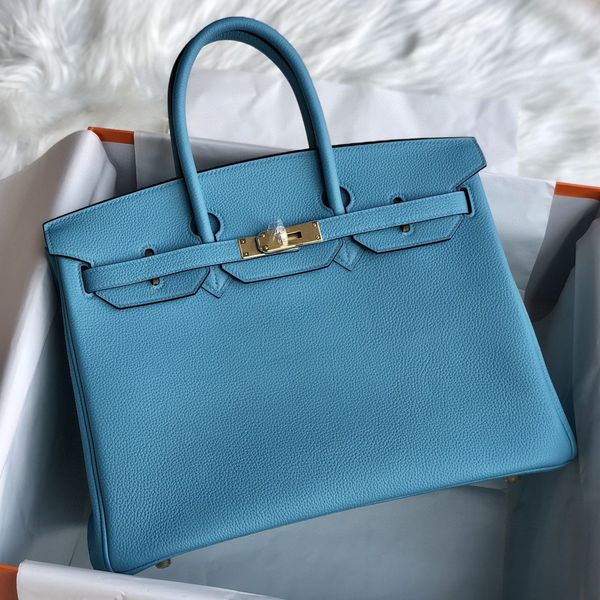 fully handmadequality,30cm,togo leather designers purse,wax stitching,gold or silver hardware,fast delivery,contact for details
fully handmadequality,30cm,togo leather designers purse,wax stitching,gold or silver hardware,fast delivery,contact for details