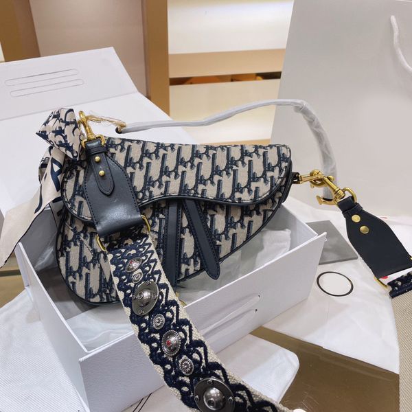 saddle bag luxury crossbody women genuine cow leather casual solid color metal buckle retro fashion personality shoulder handbags designer b
saddle bag luxury crossbody women genuine cow leather casual solid color metal buckle retro fashion personality shoulder handbags designer b