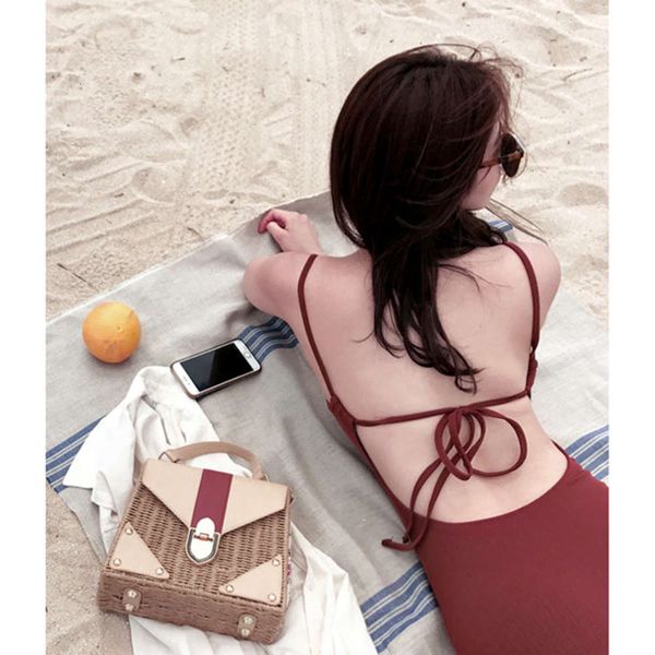 xingcheng version one piece solid color cover belly show thin backless women's spring swimming suit, White;black
xingcheng version one piece solid color cover belly show thin backless women's spring swimming suit, White;black