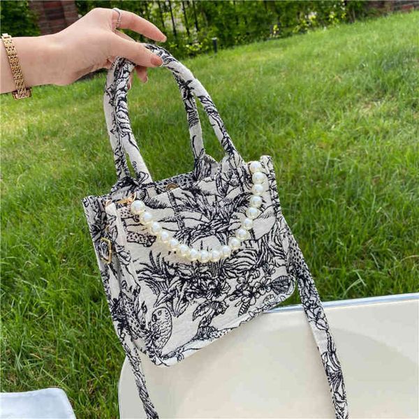 80% off shop clearance portable bag female new fashion tote minority design one shoulder canvas pearl girls diagonal
80% off shop clearance portable bag female new fashion tote minority design one shoulder canvas pearl girls diagonal